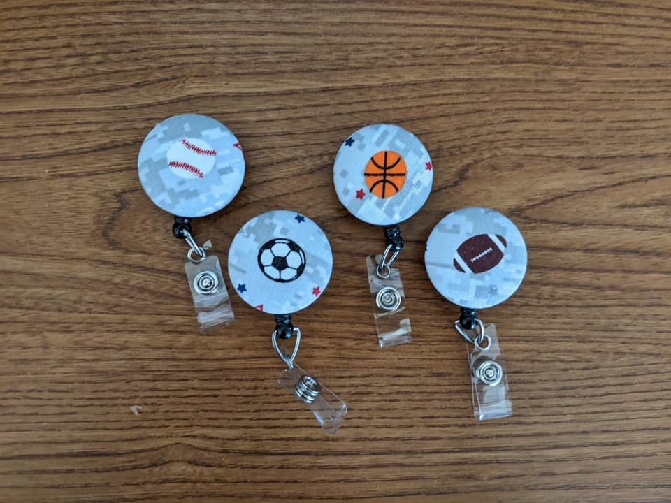 Sports ball badge reels for school or work IDs