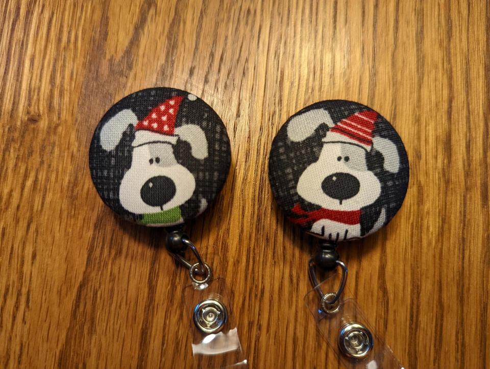 Cute dogs with winter hats badge reels for work or school IDs