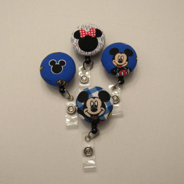 Mickey Mouse or Minnie Mouse badge reel