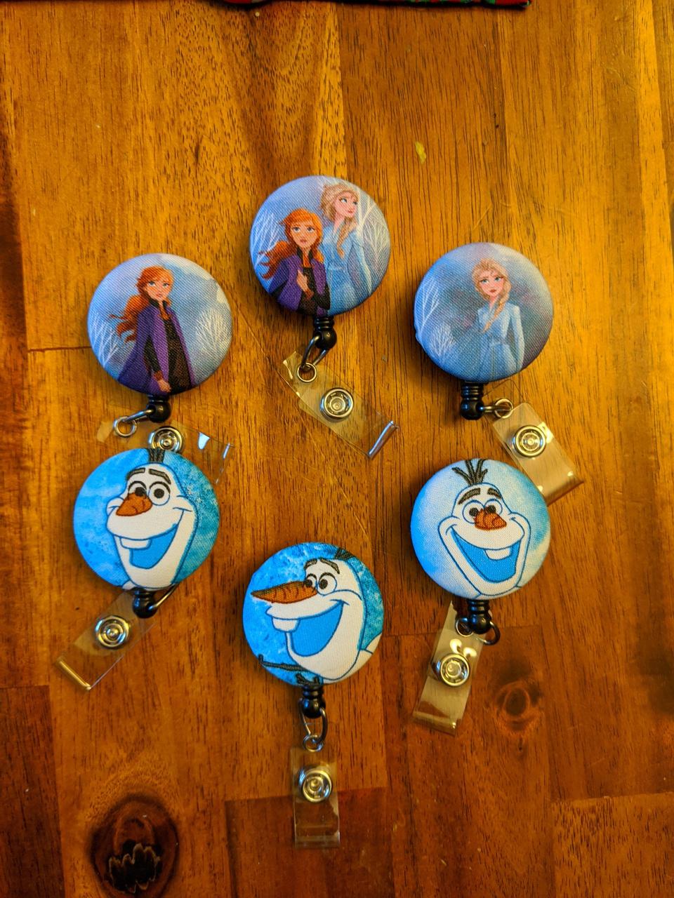 Frozen badge reels for work or school IDs