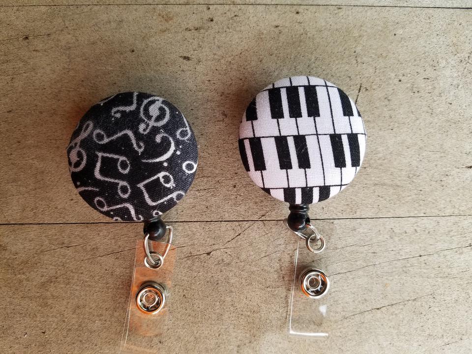 Music badge reel for work or school IDs