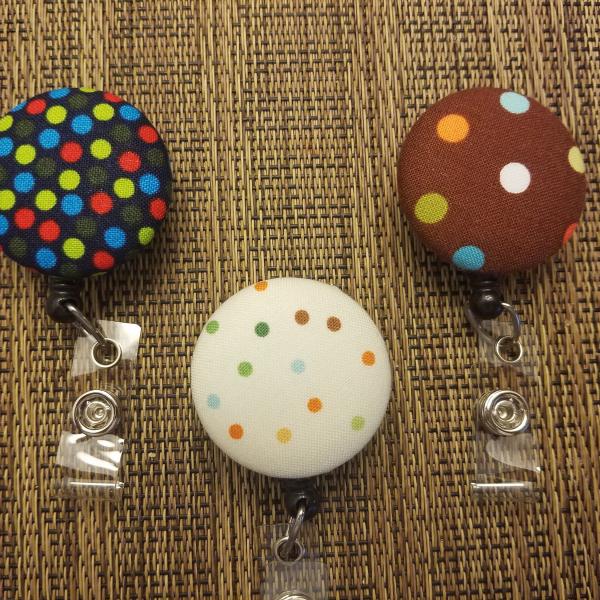 Badge reels with dots for work or school IDs